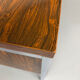 Vintage desk with rosewood veneer and chrome metal design from the 1970s.