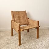 Vintage modernist straw armchair