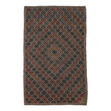 Tapis Kilim vintage à décor géométrique vert et rouge