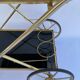 Vintage 1960's bar rolling table smoked glass gilded metal
