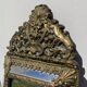 Miroir dorée à parcloses en laiton repoussé XIXème
