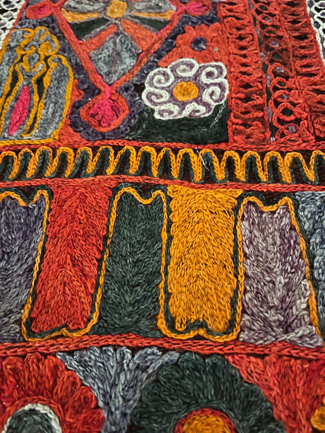 Hand woven flat woven Iraqi artisan rug.