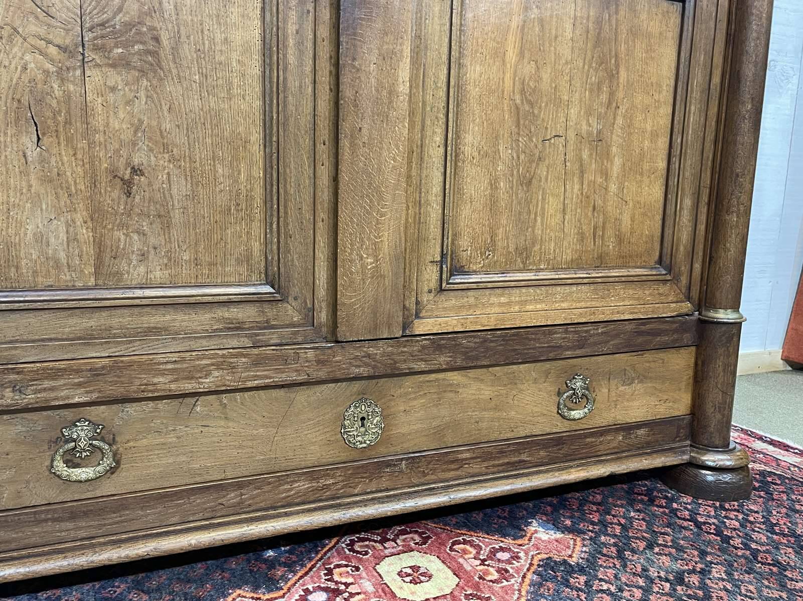Early 19th century Empire style oak wardrobe