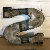 Blue sign letter "S"