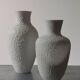 Pair of vintage biscuit porcelain vases by Metzler Ortloff.
