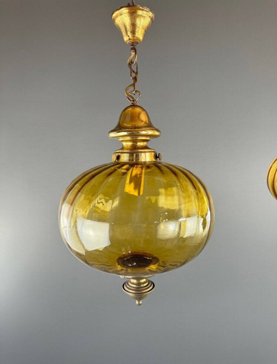 Pair of vintage amber blown glass lantern pendant lights, 20th century