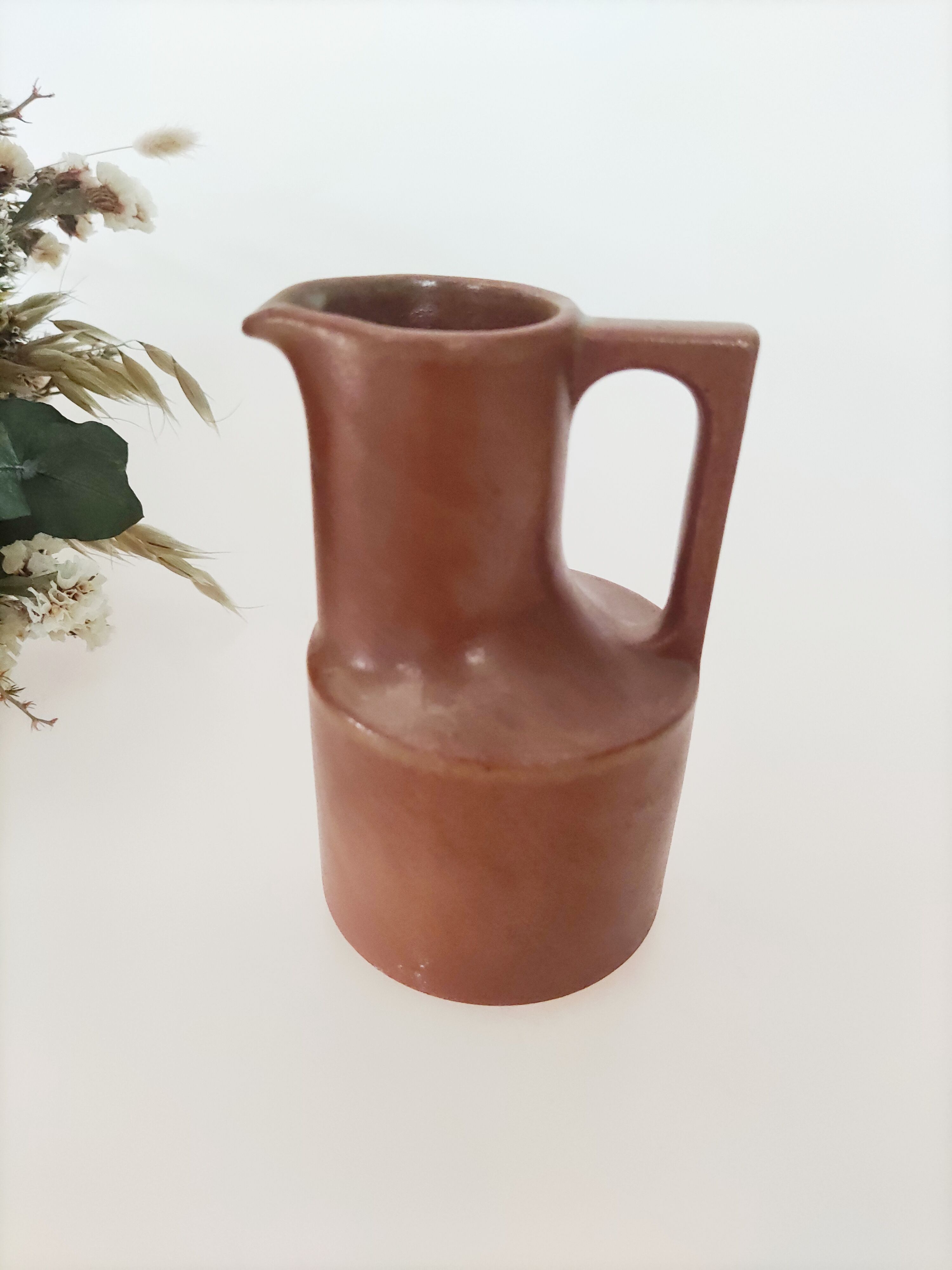 Signed sandstone pitcher