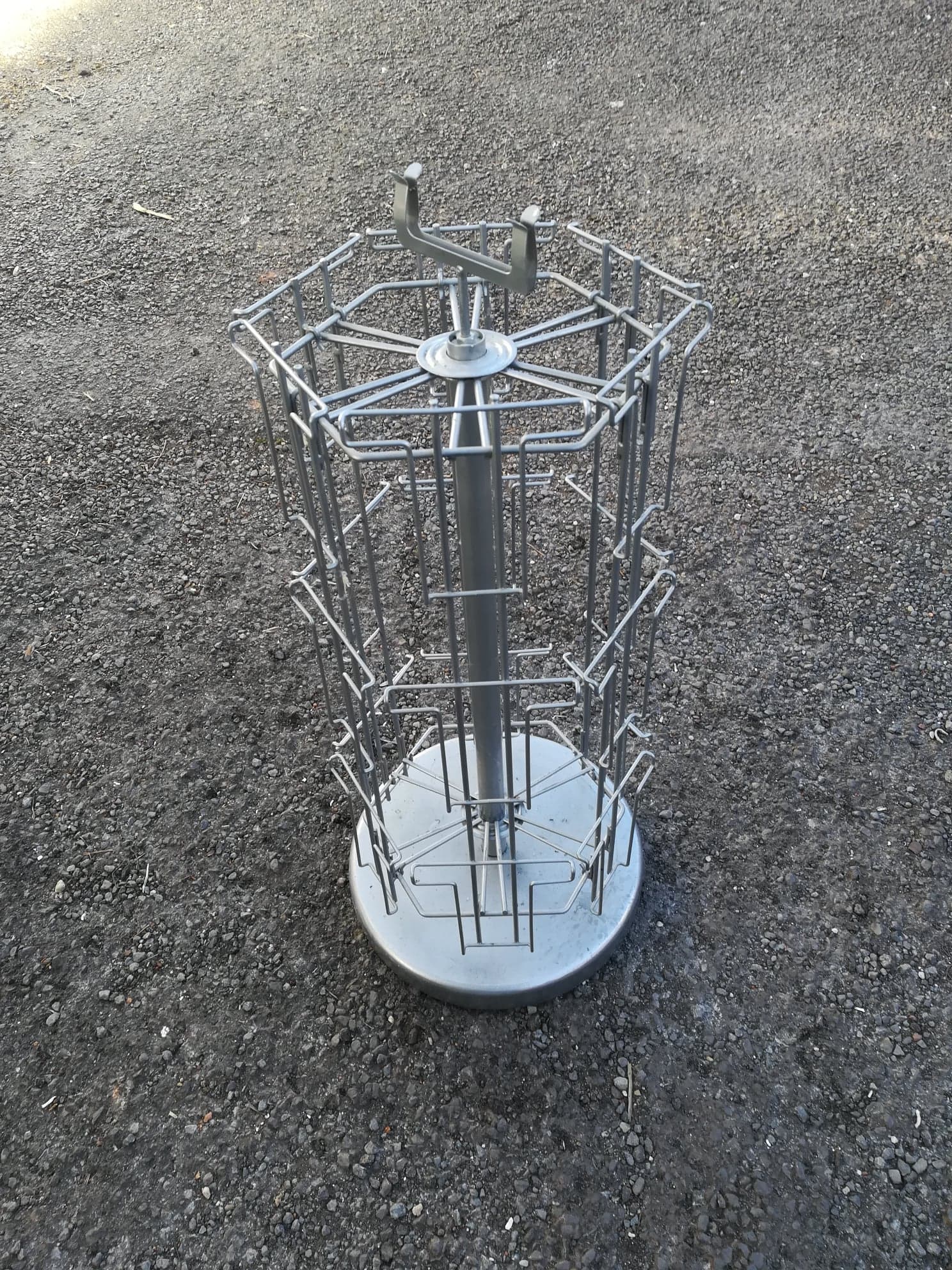 Postcard turnstile display in silver metal