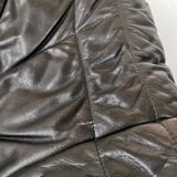 Pair of black leather armchairs from the 80s