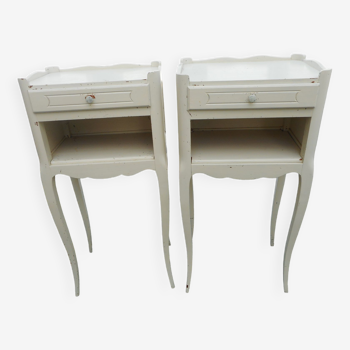 Pair of white lacquered bedside tables