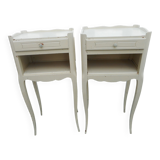 Pair of white lacquered bedside tables