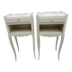 Pair of white lacquered bedside tables
