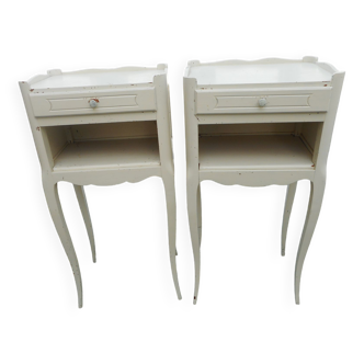 Pair of white lacquered bedside tables