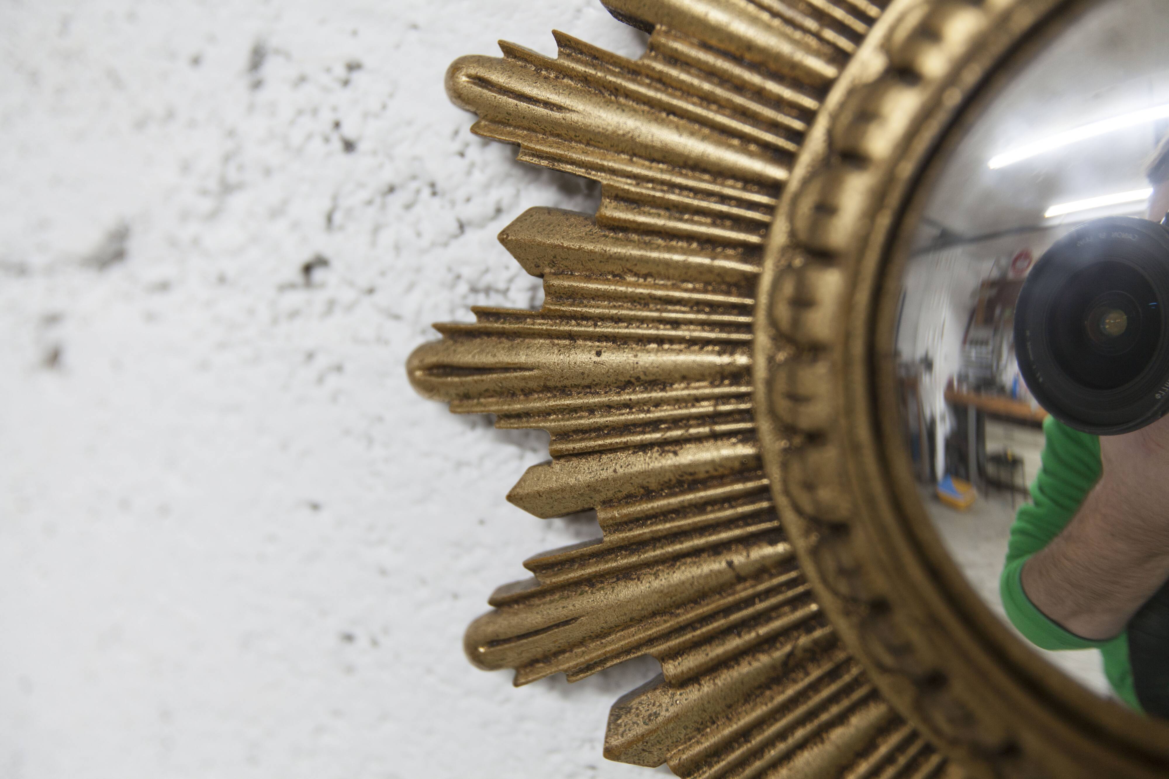 Vintage 1970s convex witch's eye sunburst mirror