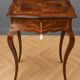 work table from the Napoleonic III era with marquetry of scrolls and patterns