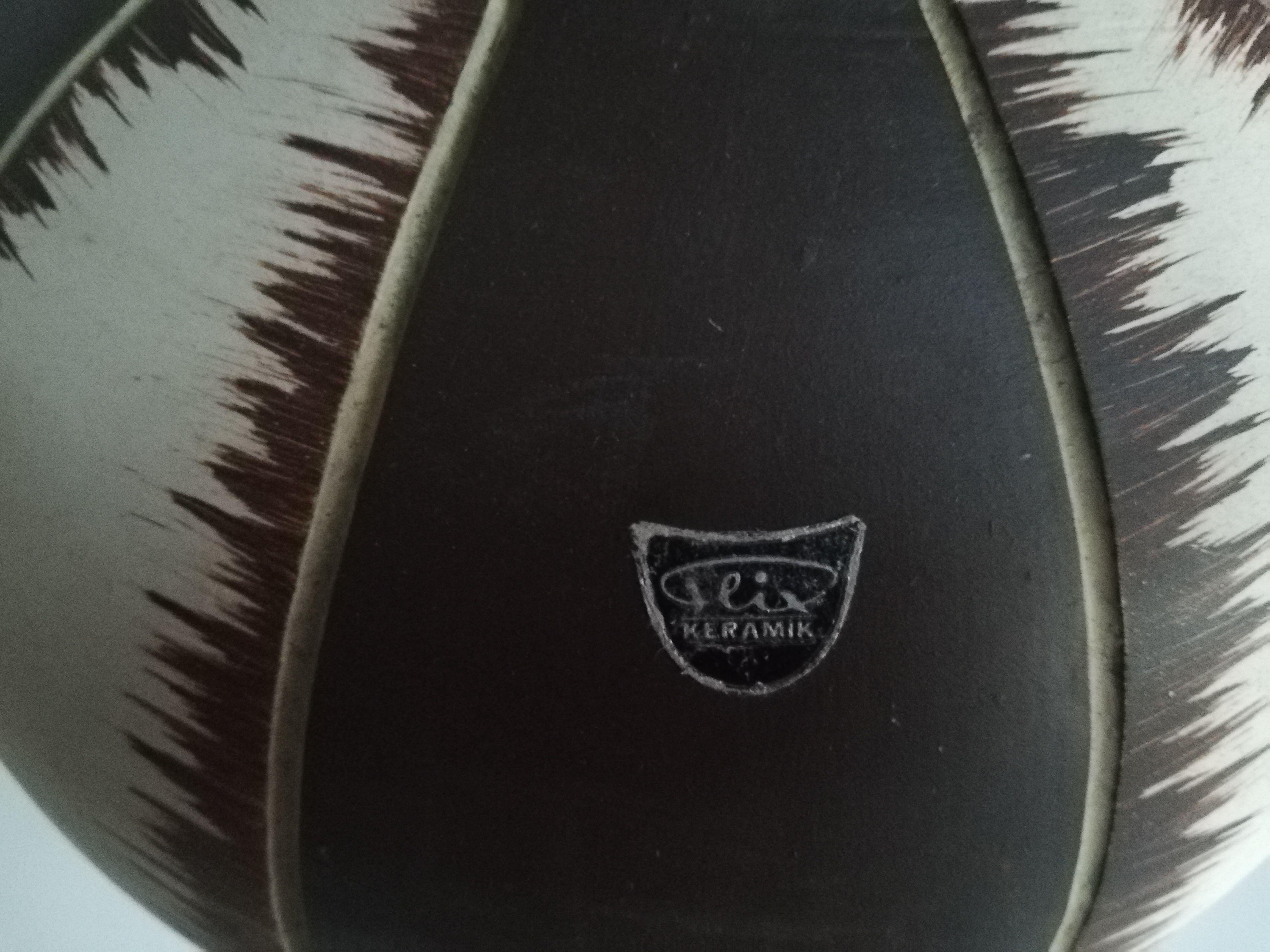 Ceramic pitcher signed