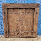 Old wooden tribal window