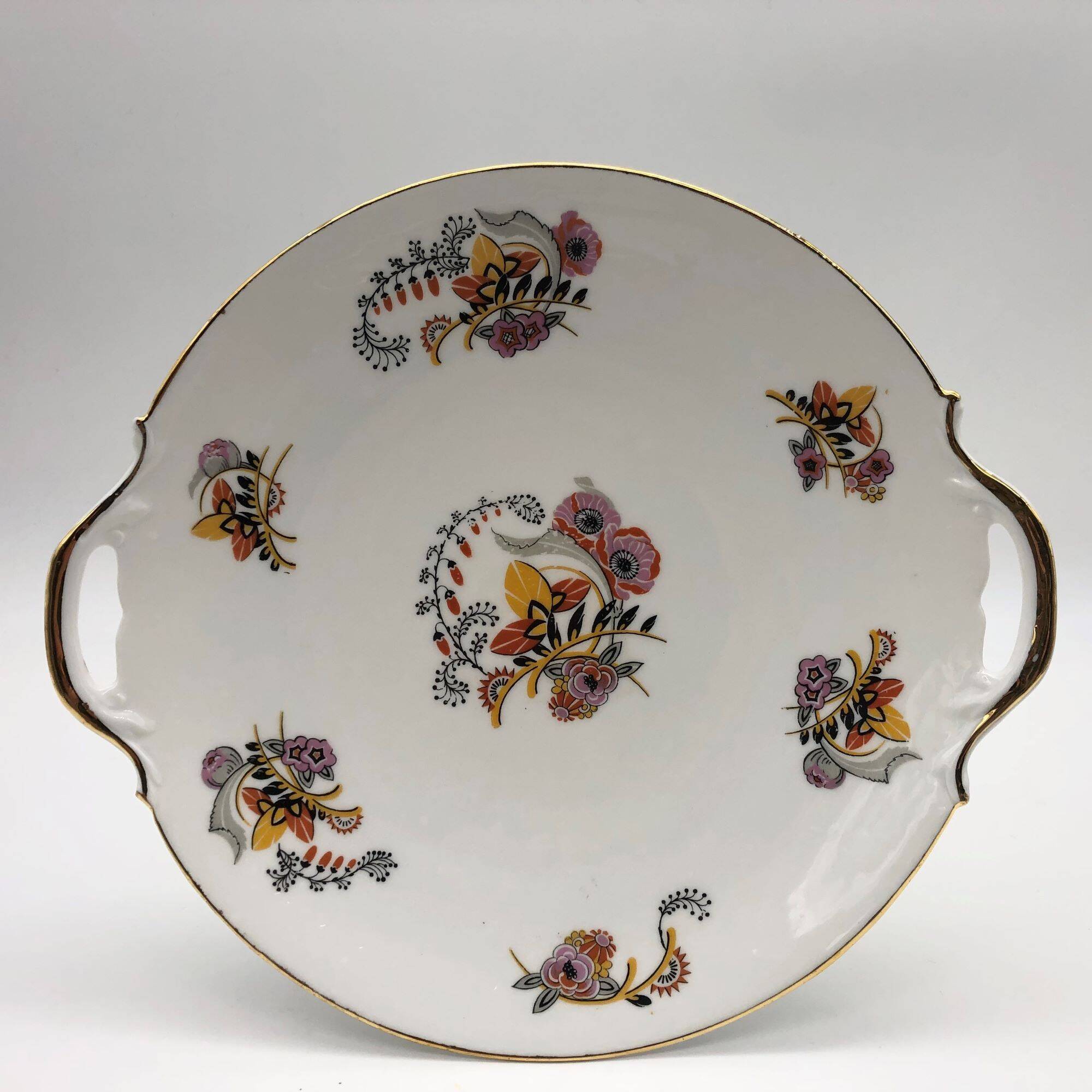 6 Dessert plates and a serving dish, M-Fres.