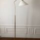 1950 floor lamp rises downwards in diabolo brass