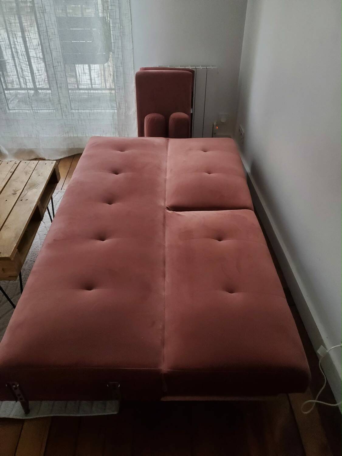 Powder pink convertible sofa