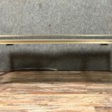 Design coffee table in gilded metal and tinted glass