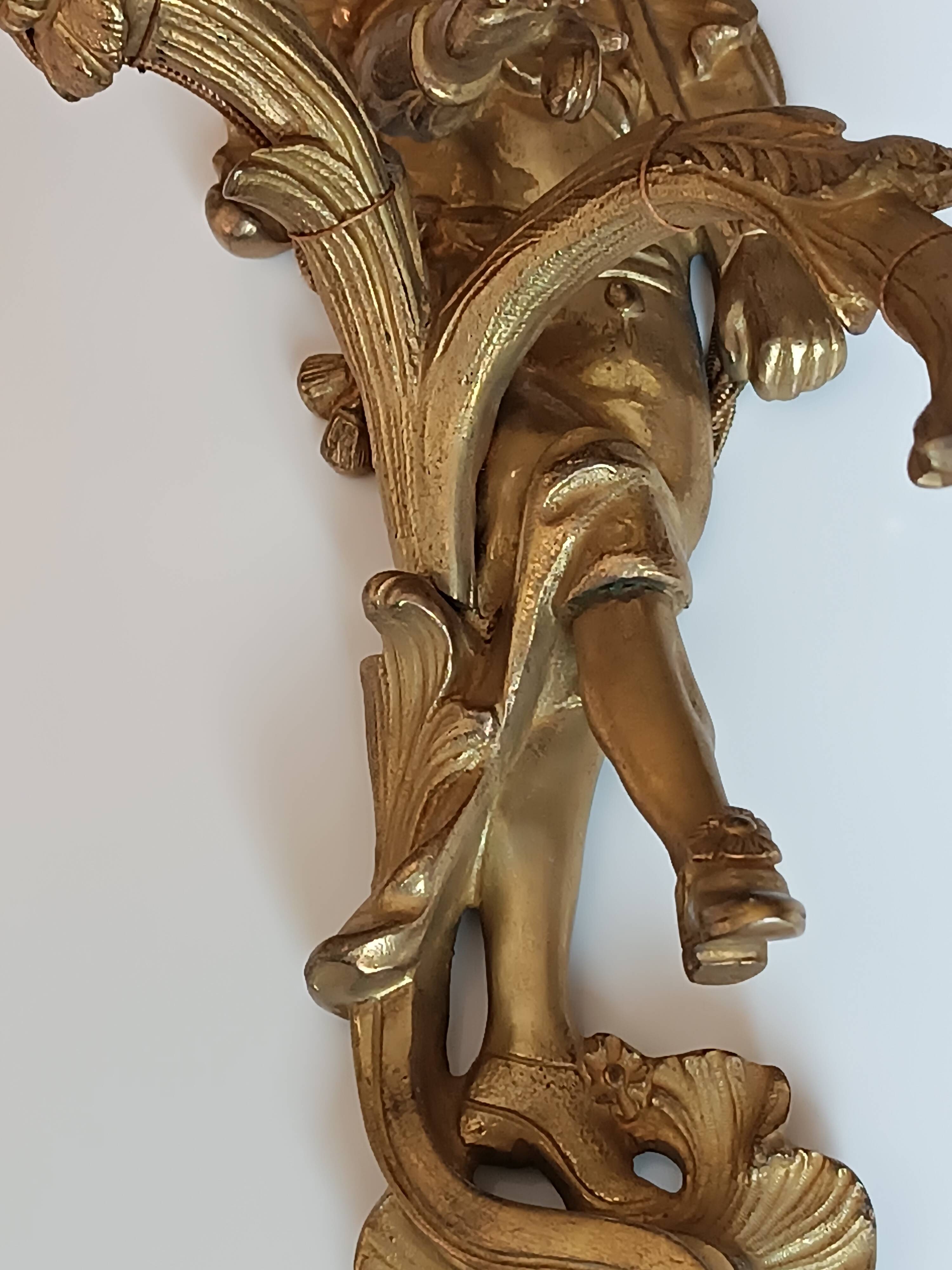 Pair of Regency style gilt bronze wall lights