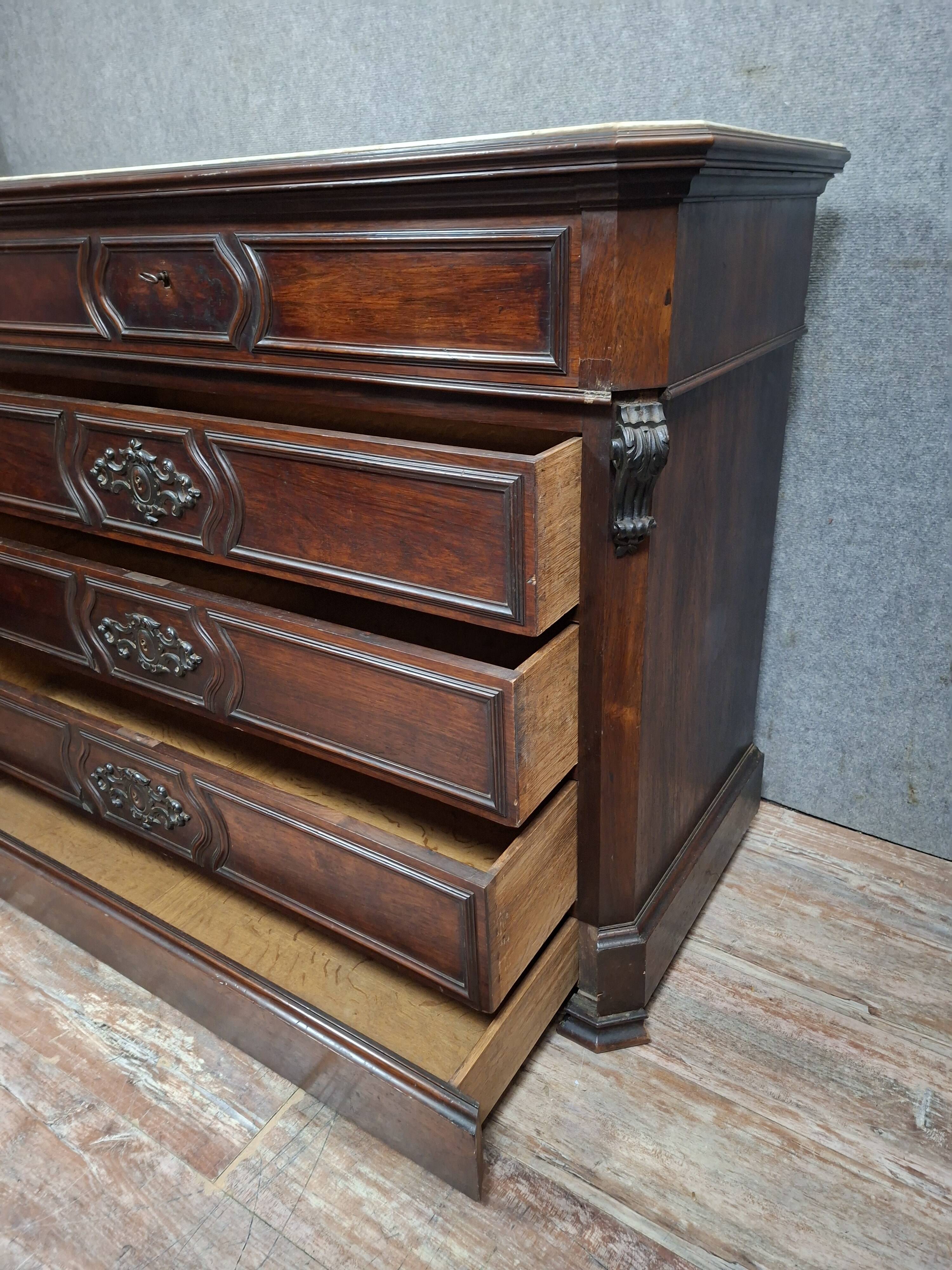 Napoleon III period secretary chest of drawers in mahogany and light wood.