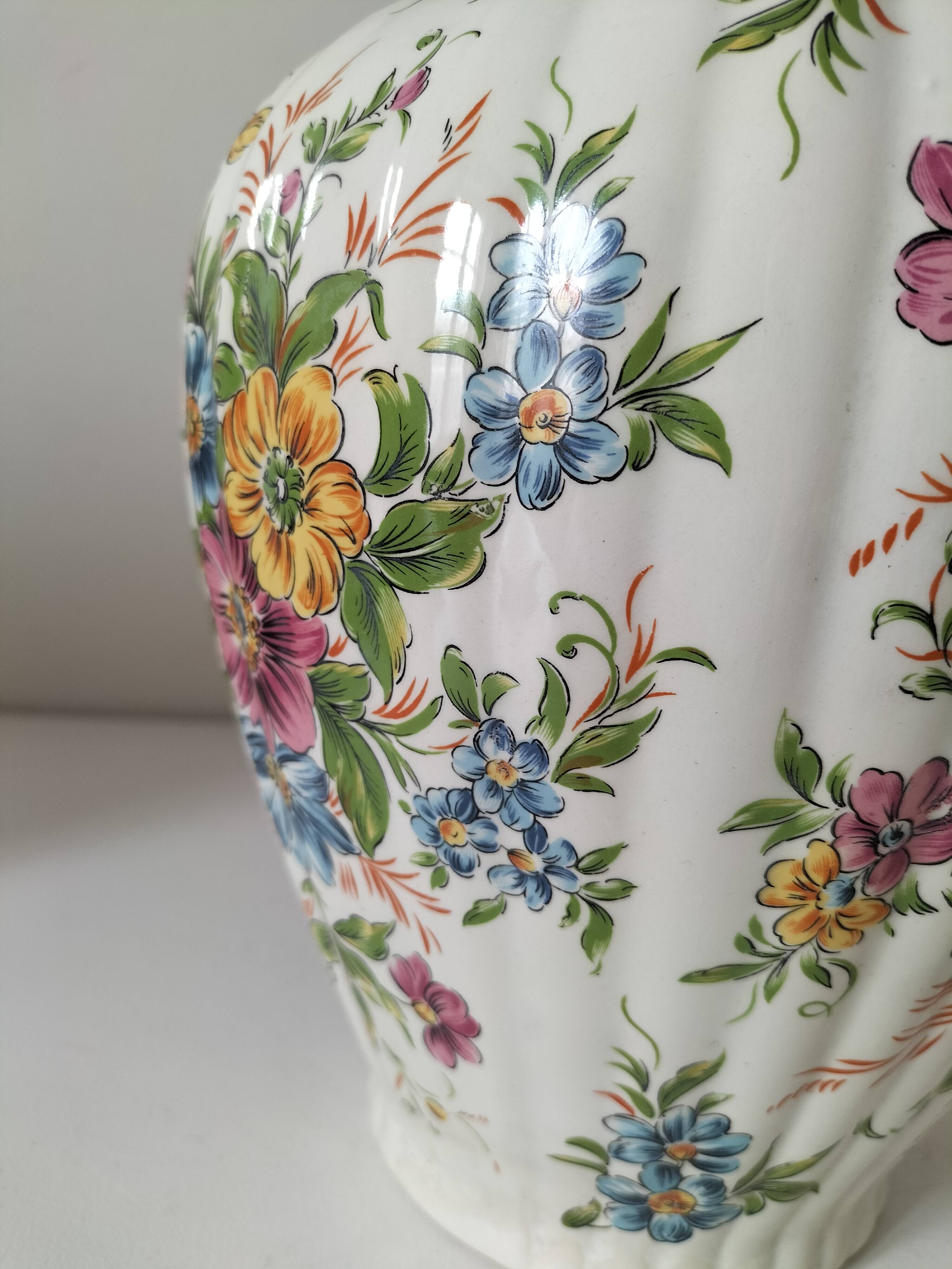 Antique vase with floral decoration in enamelled earthenware – timeless charm
