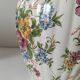 Antique vase with floral decoration in enamelled earthenware – timeless charm