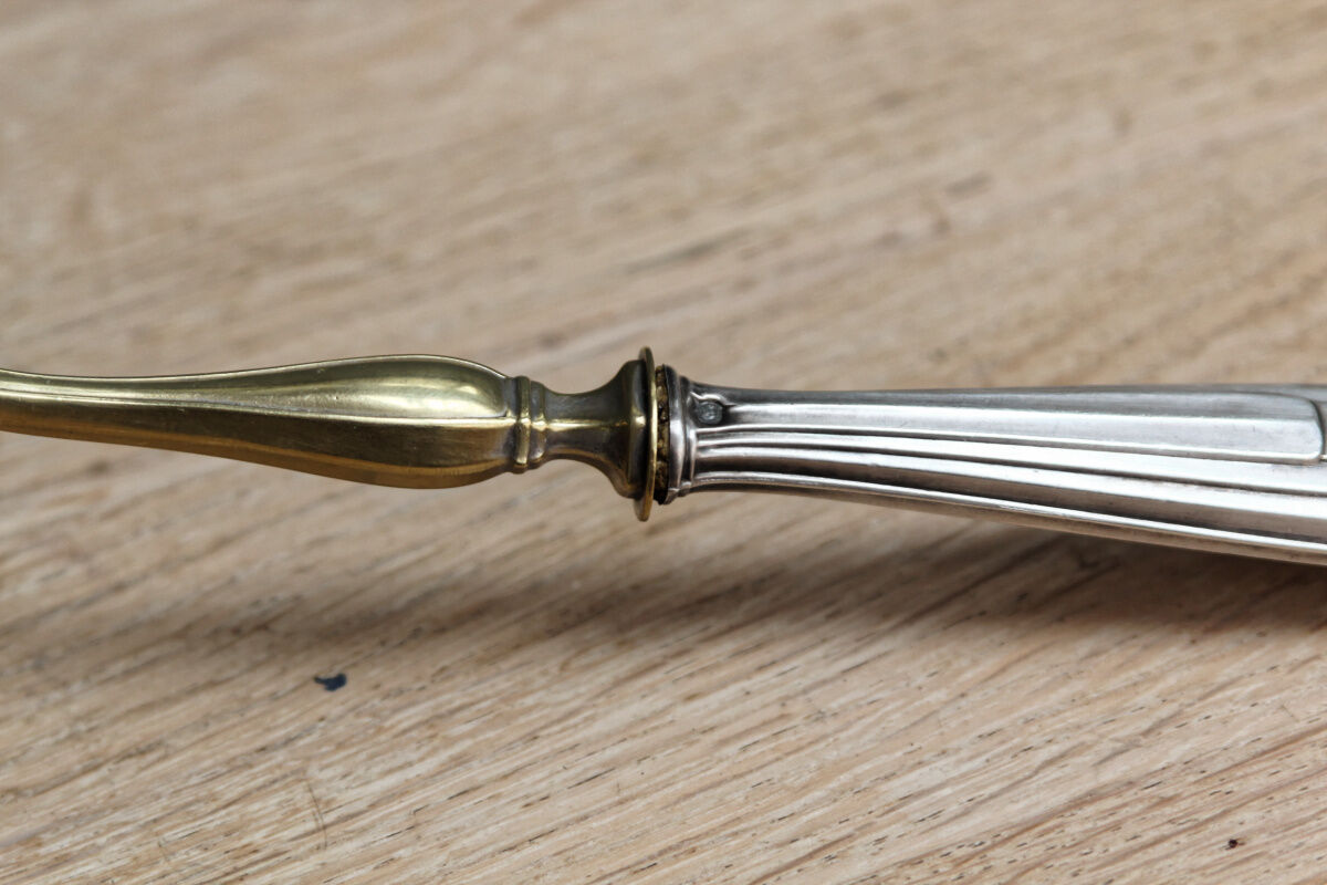 Filled silver cream ladle