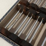 Coffret de 12 porte-couteaux Art déco