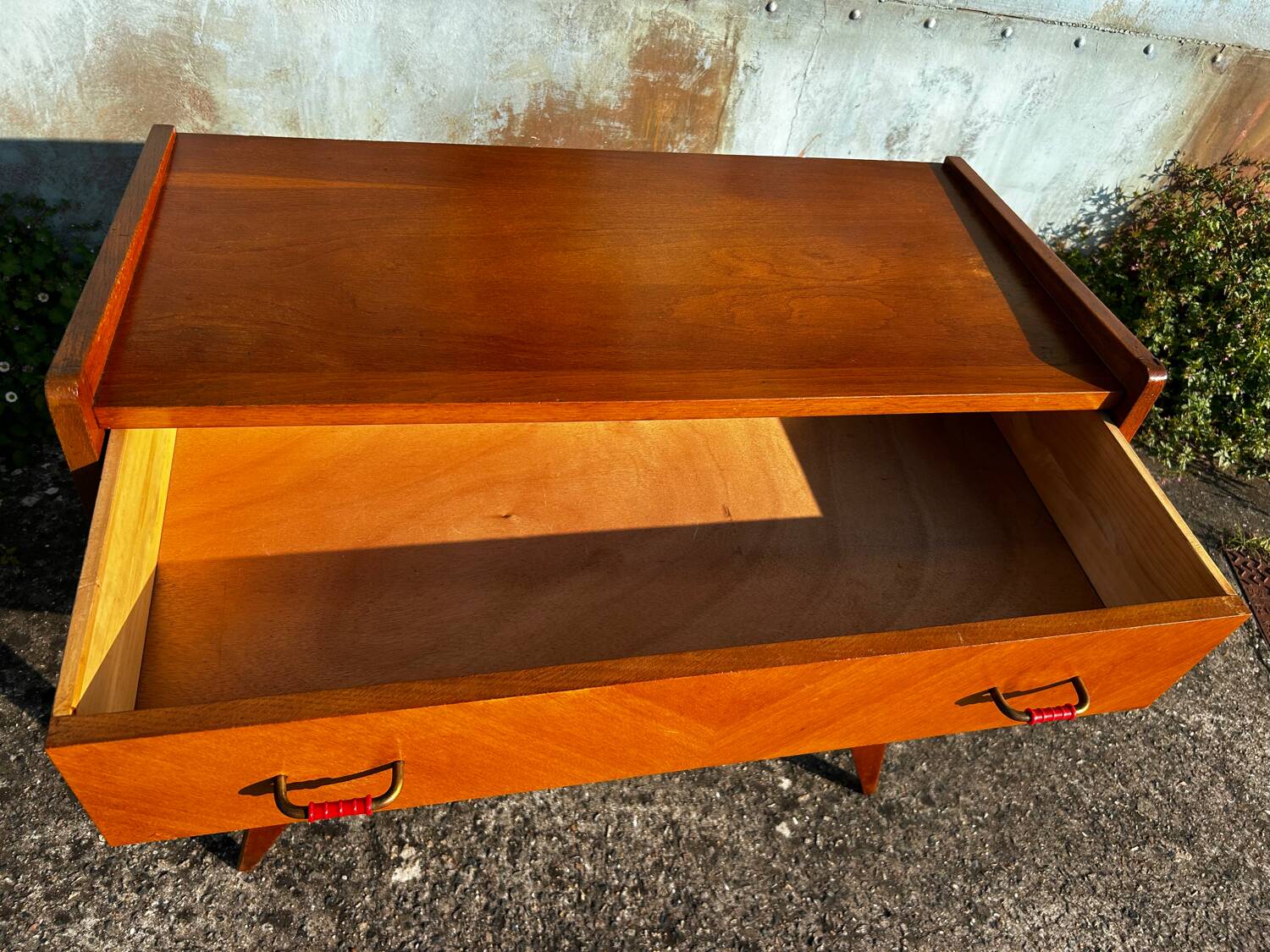 Vintage chest of drawers with compass feet.