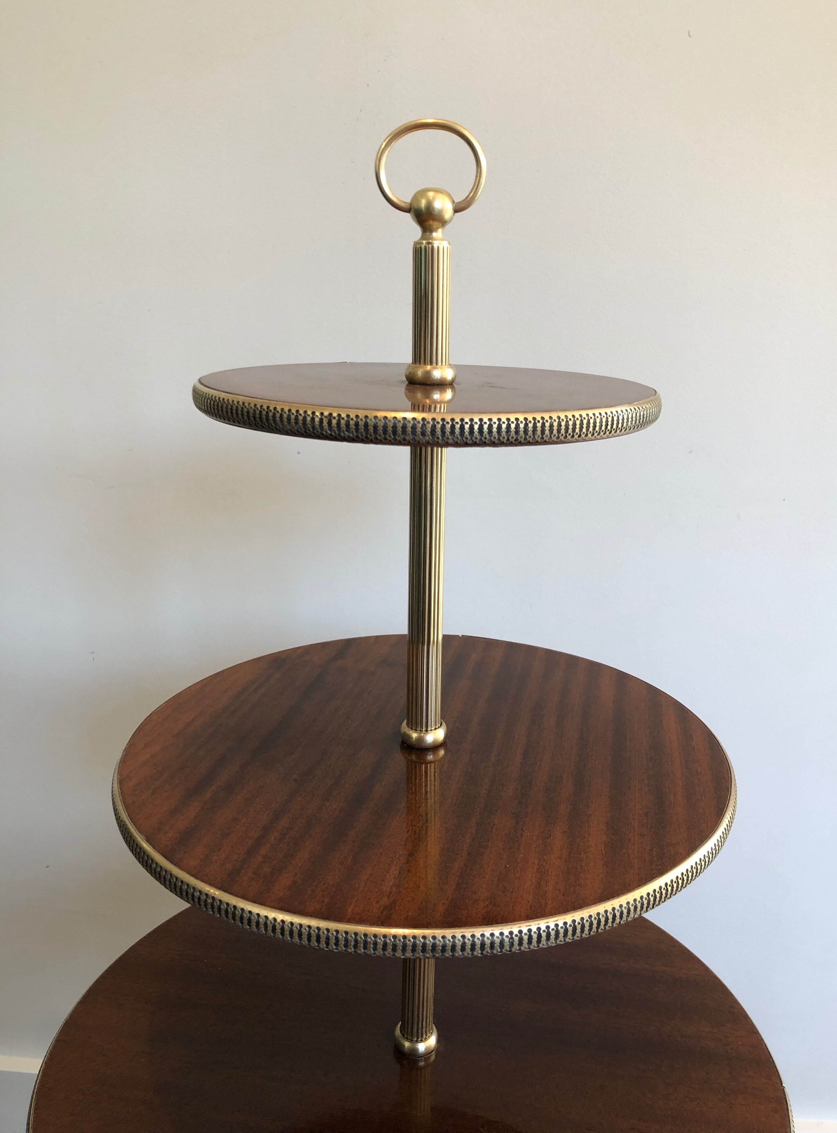 Round table of neoclassical style with triple plateaux 1940