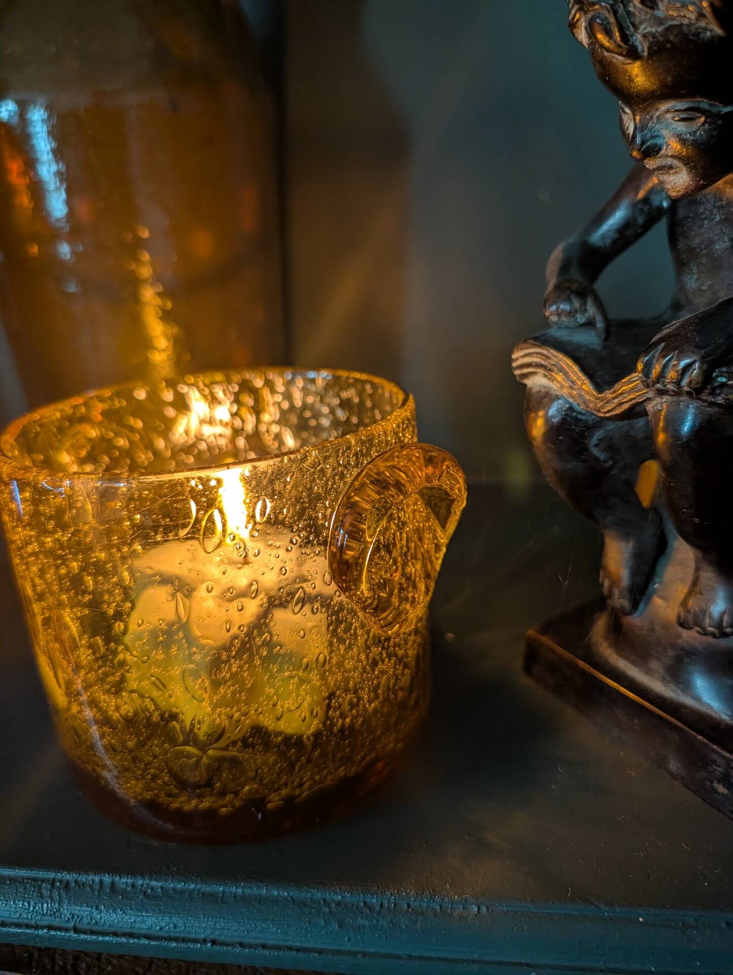 Small vase or amber bubbled glass tealight holder