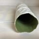 Vase with patterns of rolled paper leaves