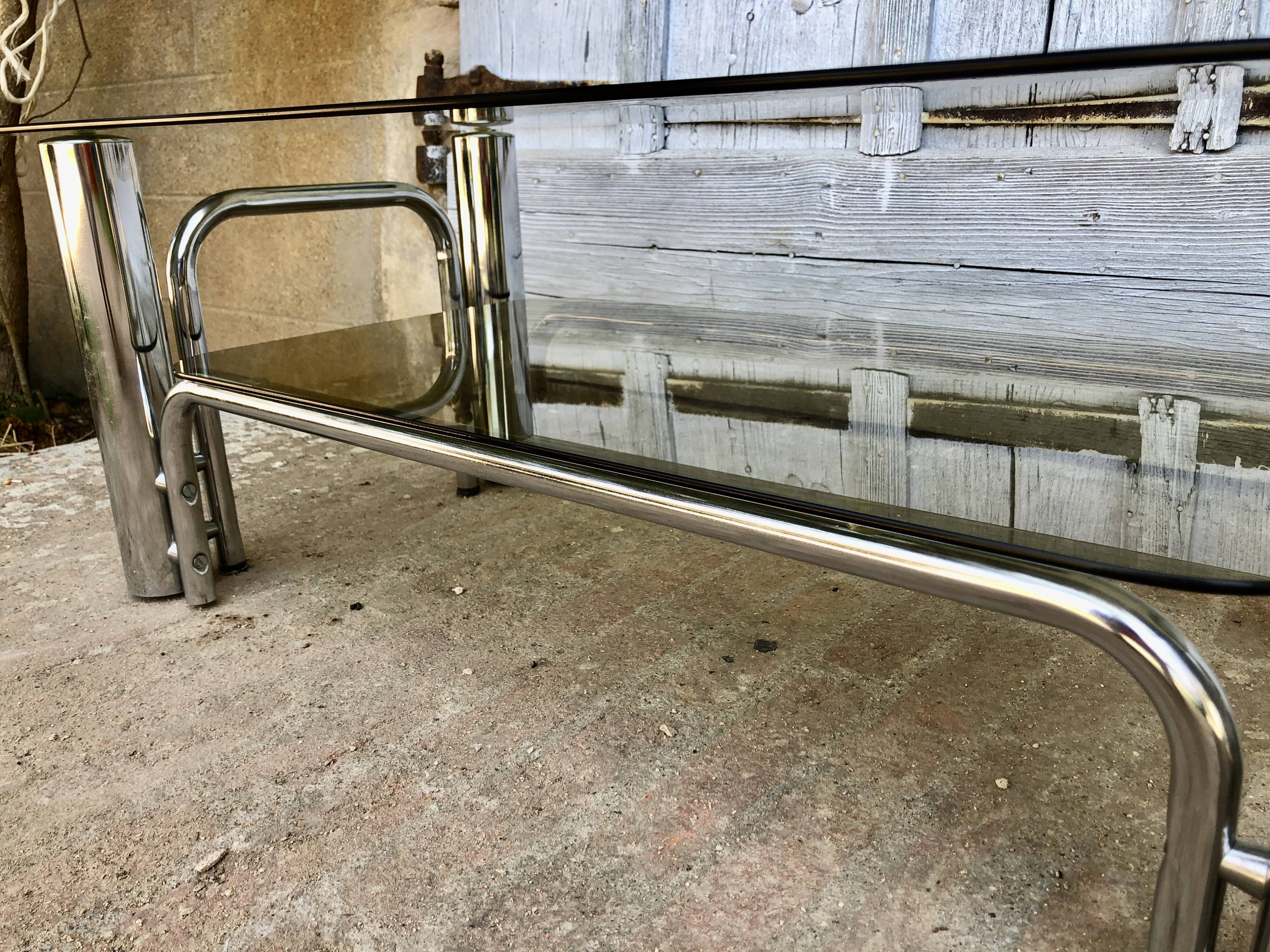Coffee table chrome tubes and smoked glasses 1970