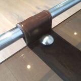 Coffee table in chrome, leather, and smoked glass