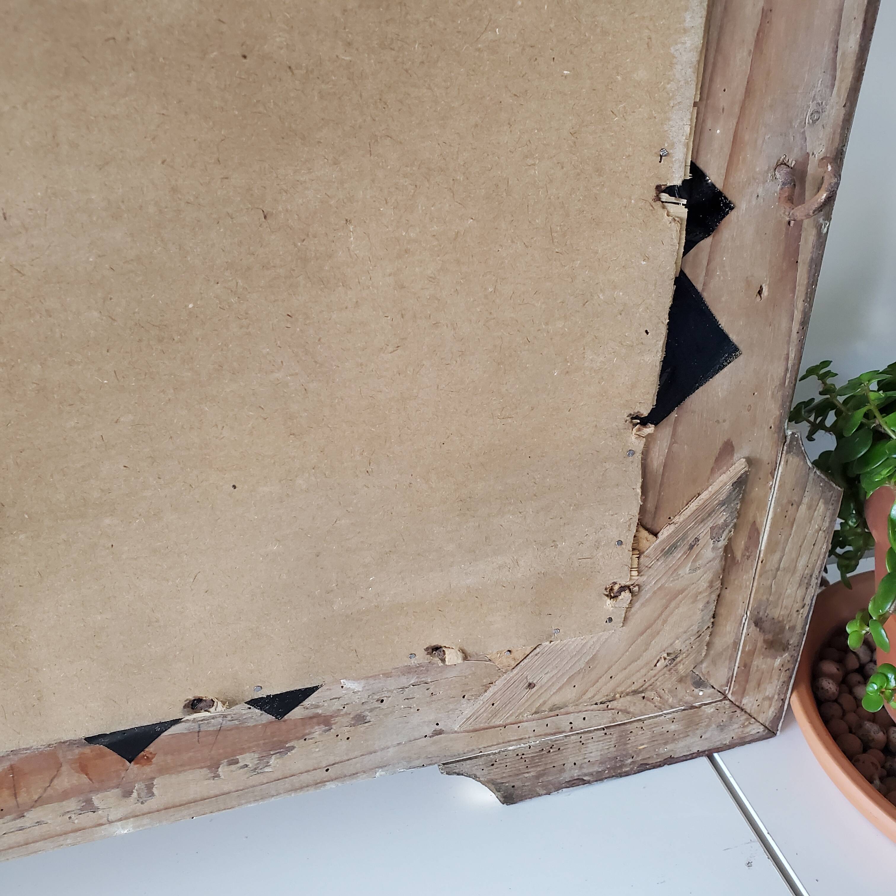 Antique mirror with gilded wood crests