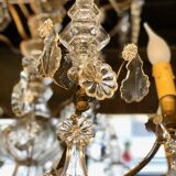 Large chandelier with tassels and old daggers