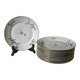 10 assiettes à dessert à fleurs bleues, liseré doré en porcelaine véritable LF en bon état.