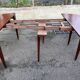 19th-century wooden extendable console table with 3 extensions.