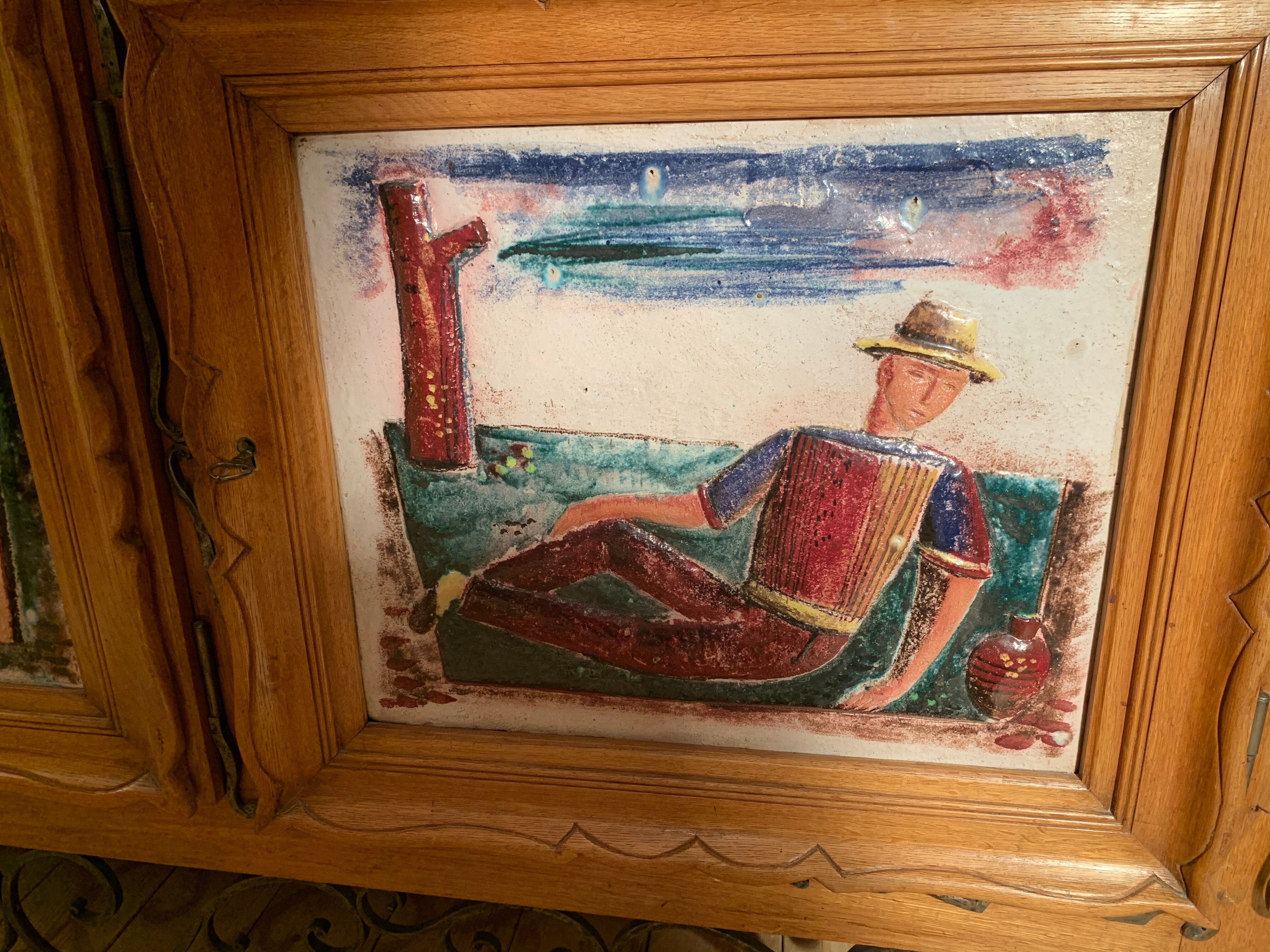 Modernist wood and ceramics sideboard of the 1950s