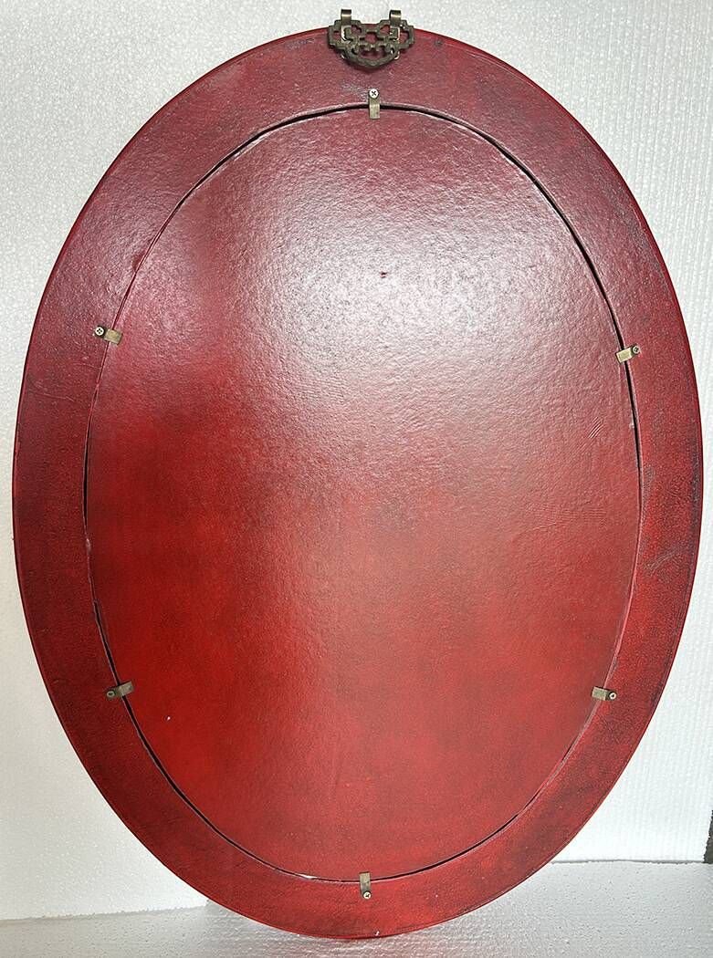 Oval Chinese mirror in leather style