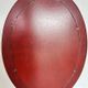 Oval Chinese mirror in leather style