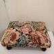 Vintage footrest in wood and fabric