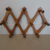 Folding wall coat rack