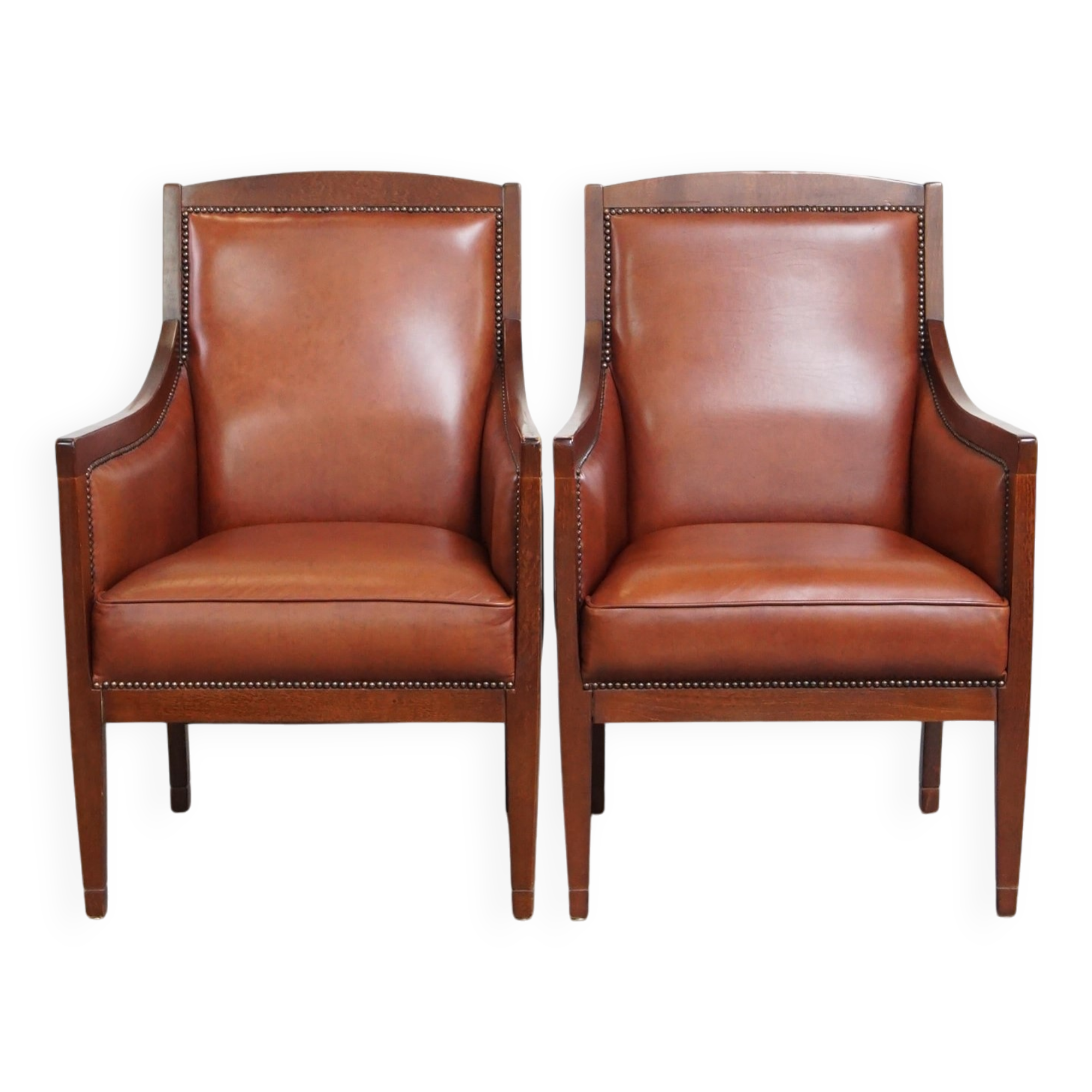 Majestic, luxurious set of 2 cognac-colored cowhide leather Art Deco design armchairs