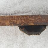 Natural wood pediment with bunches of grapes