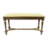 Antique gilded wooden bench in Louis XVI style, 19th century.
