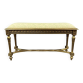 Antique gilded wooden bench in Louis XVI style, 19th century.